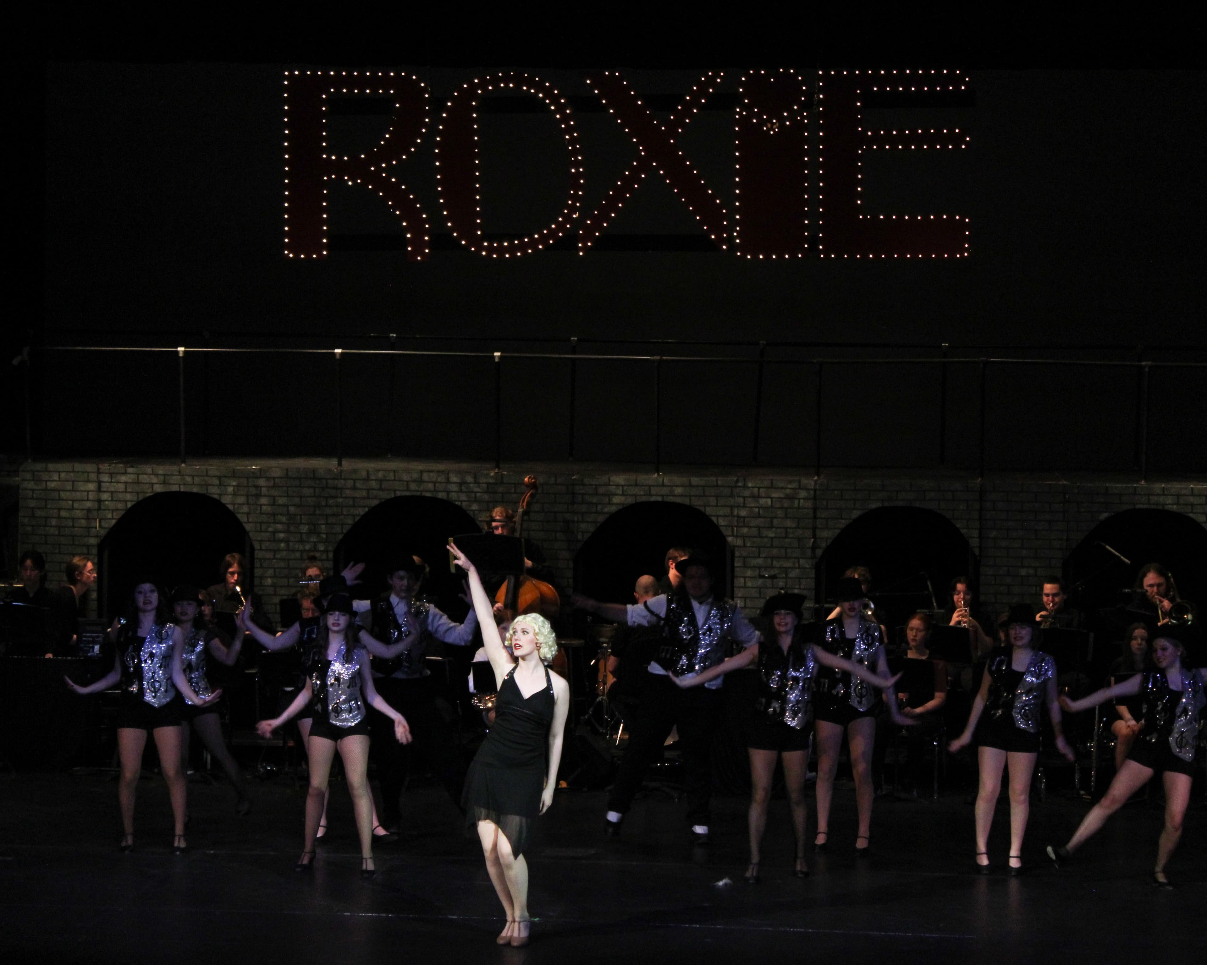 Maya performing as Roxie in Chicago with ensemble